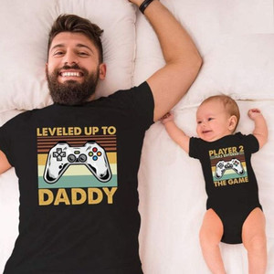 father and son with personalized gamer t-shirts