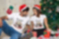 Couple dressed for christmas with personalized t-shirts